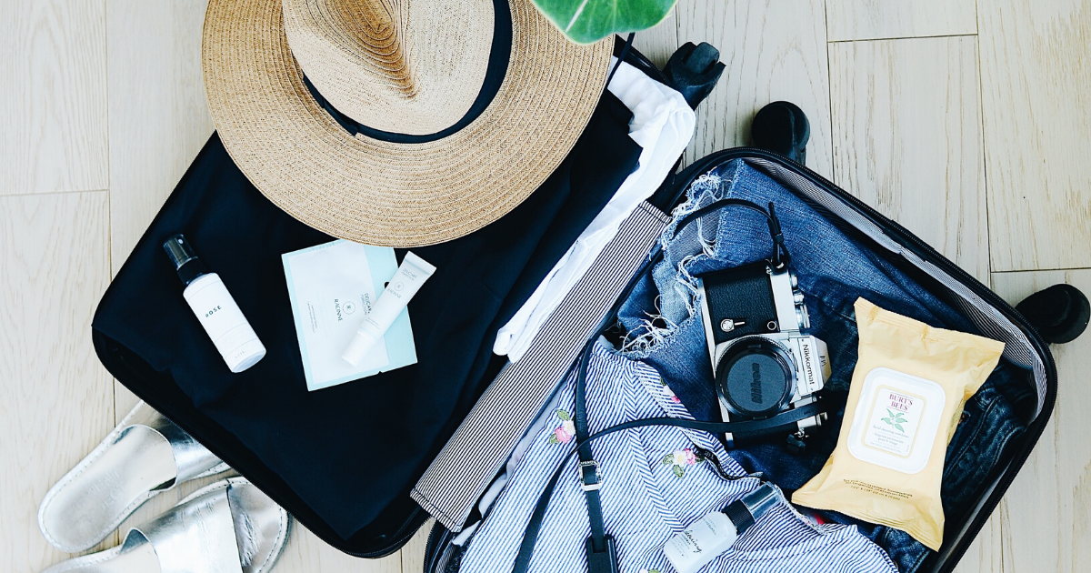 Travel 101: Essential Suitcase Packing Tips - Confetti Travel Cafe
